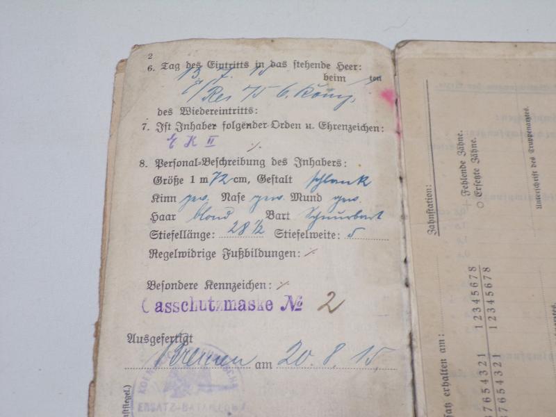 WW1 Iron Cross, Service Book and Bar.